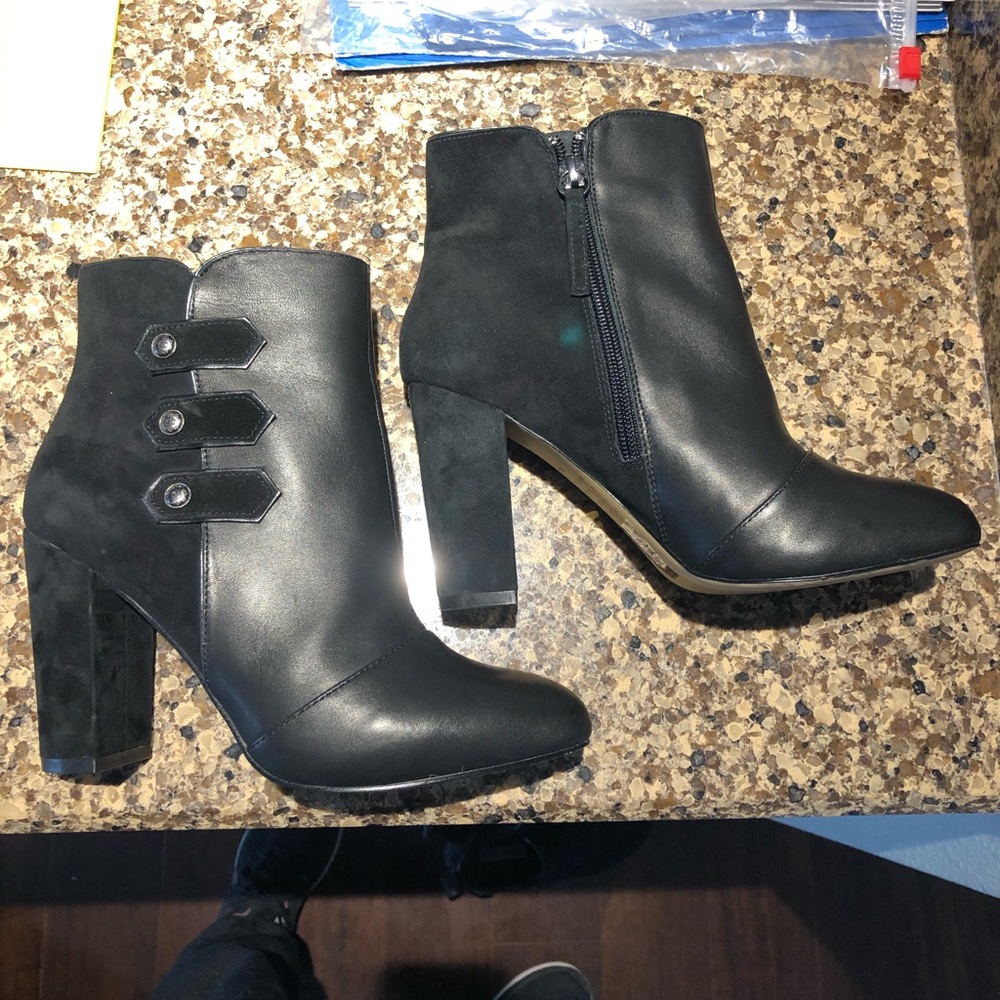 Black leather & suede heels. Worn once.